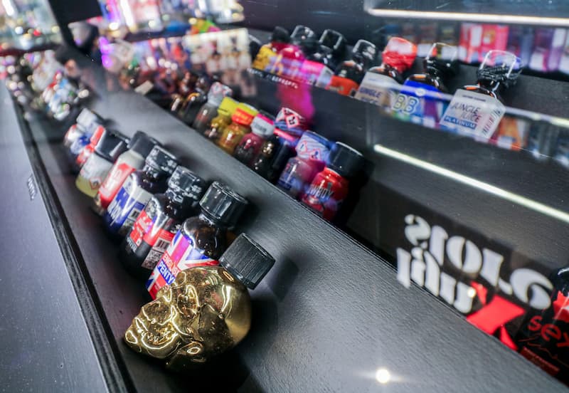 A display case of bottles, seen in perspective